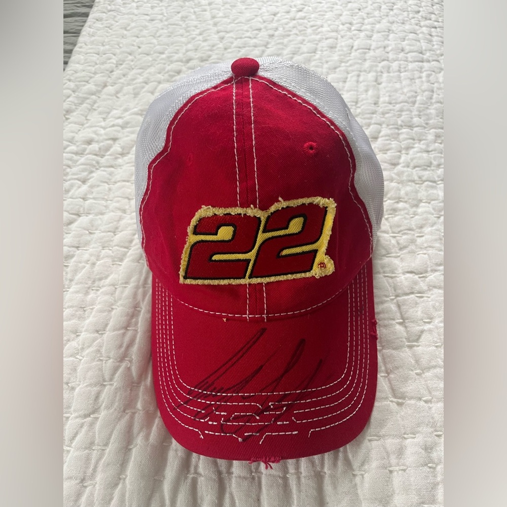 Signed Joe Logano trucker hat. #22